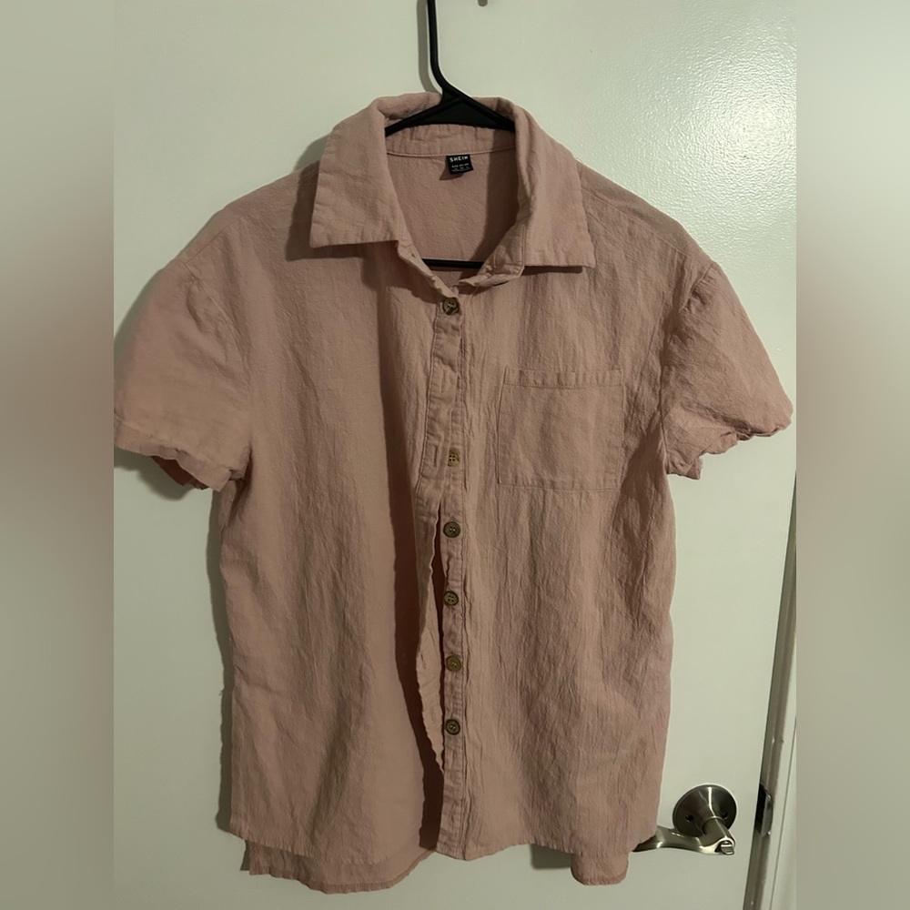 Size medium. Button up shirt and bottoms set.
